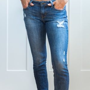 Fake ripped skinny jeans